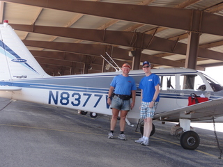 Tony's picture of N8377W at Nokai Dome airstrip with Adam running