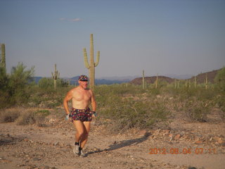 Adam running at Windmill airstrip (tripod)