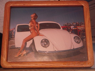 scantily-class lass on Volkswagon beetle