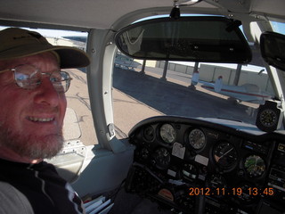 Tony's picture of N8377W at Nokai Dome airstrip with Adam running