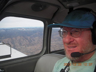 185 84r. Adam flying over mountains