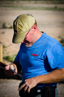 Yaseen's pictures - Adam taking pictures of Cactus Fly-in stickers