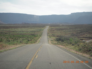 11 89s. driving Route 128 along the Colorado River