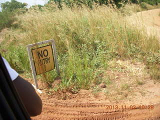 83 8f2. Uganda - drive to Murcheson Falls National Park - NO ENTRY sign