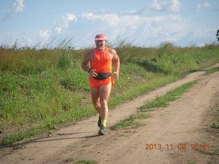 109 8f3. Uganda - eclipse site - Adam running