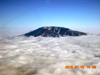 11 8v2. aerial - Navajo Mountain surrounded by clouds