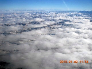 35 8v2. aerial - snow and clouds and canyon