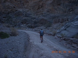 driving from Fisher Towers hike - Adam running - tripod and timer
