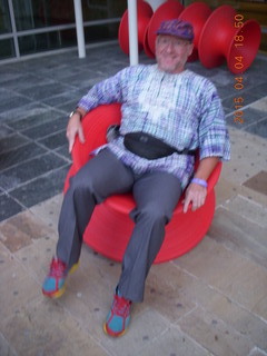 my cat Penny peeking over the chair