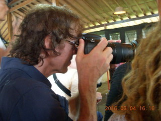 255 994. Indonesia - music and puppet show - people taking pictures