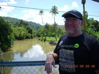113 998. Indonesia village - Adam on bridge