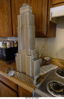 my cardboard Empire State  Building trashed by my cat Max