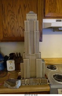 my cardboard Empire State  Building trashed by my cat Max