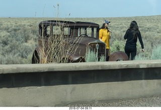 48 a03. Petrified Forest National Park - old, beat-up car on Route 66