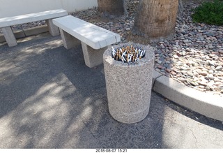 lots of cigarettes in the ashtray