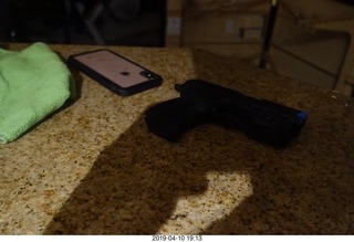 cell phone and pistol