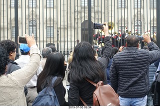301 a0f. Peru - Lima tour - changing of the guard - cell phone photographers