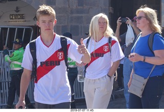 350 a0f. Peru - Cusco square - Niko and Sydney in soccer outfits
