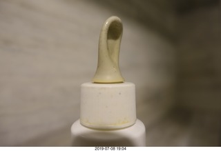 314 a0f. Peru - Lima - from Cusco to Lima - squished eyedropper from pressure change