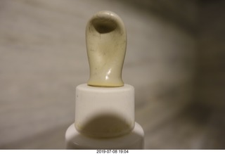 315 a0f. Peru - Lima - from Cusco to Lima - squished eyedropper from pressure change