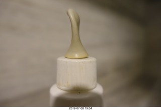 316 a0f. Peru - Lima - from Cusco to Lima - squished eyedropper from pressure change