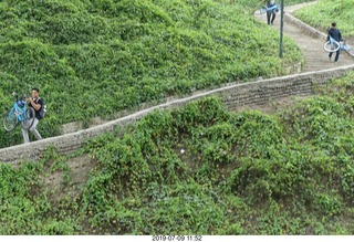 84 a0f. Peru - Lima - beach walk - people carrying their bicycles up the stairs