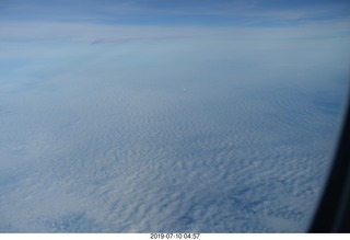 11 a0f. another airliner in the distance