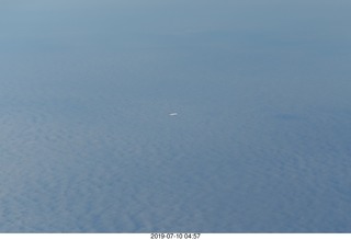 12 a0f. another airliner less in the distance