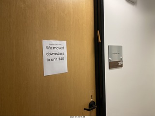 hallway with we-moved-downstairs sign