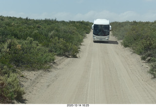 249 a0y. Argentina Eclipse Day - driving back to Neuquen - other bus driving backwards