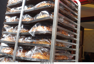 65 a0y. Argentina - Buenos Aires - lunch at Pertulli restaurant - bread cake snacks