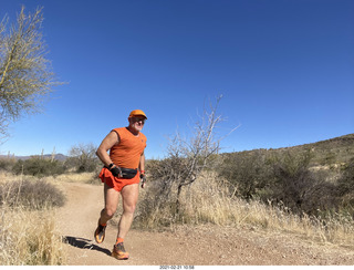 Adam shirtless atop North Mountain hike