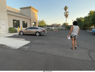 Anthony and his damaged car with new tires