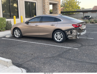 Anthony's damaged car with new tires