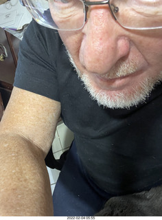 Adam with my cat Devin on my lap