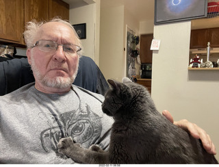 Adam with my cat Devin on my lap