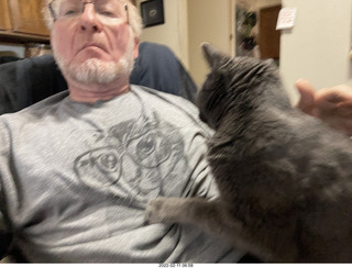 Adam with my cat Devin on my lap