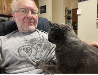 Adam with my cat Devin on my lap