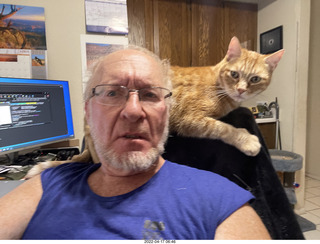 Adam with my cat Devin on my lap