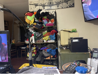 my cat Jane in my clothing rack