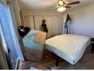 home construction - mattress coming out of the box + Olga + Anthony