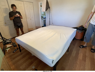 home construction - mattress coming out of the box + Anthony