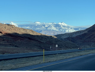 339 a1n. road south to moab - Lasalle Mountains in clouds