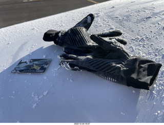 11 a1n. my de-icing equipment - gloves and a national parks card