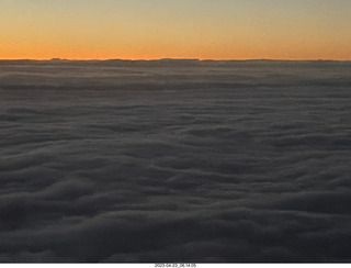 15 a1s. airline aerial sunrise over the ocean