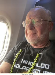 25 a23. Adam in airline seat