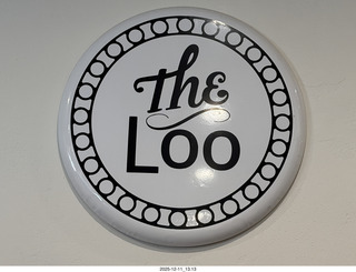 311 a2q. Dewey's restaurant restrooms sign