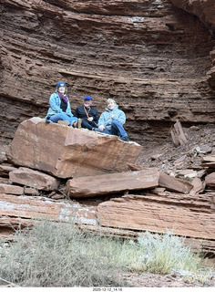 406 a2q. Utah - Hidden Splendor hike - Heather, Adam, and Tyler on rock