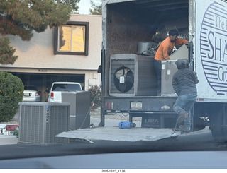 170 a2q. neighbor's house with air conditioner on the street with truck