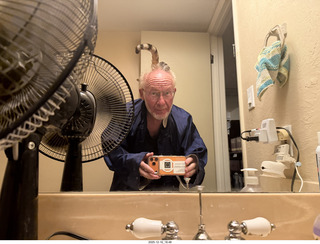 cat Pickle on my coat rack